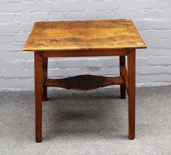 An 18th century oak rectangular side table on tapering square supports united by shaped stretcher, 66cm wide x 64cm high.