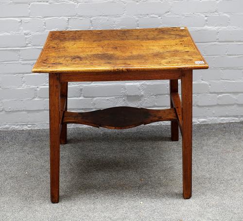 An 18th century oak rectangular side table on tapering square supports united by shaped stretcher, 66cm wide x 64cm high.