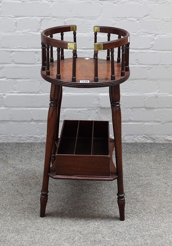 A brass mounted mahogany bottle stand, probably 19th century and adapted, with galleried top, on slender baluster tapering legs united by a concave sh