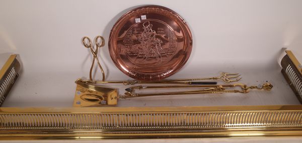 Metalware, comprising; a brass fender, a quantity of fire tools and a copper dish, (5).