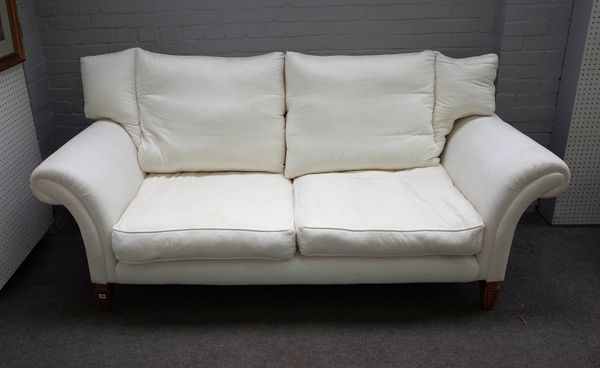 Possibly Linley; a 20th century two seat sofa with outswept arms on tapering square supports, 217cm wide x 91cm high, together with a matching armchai