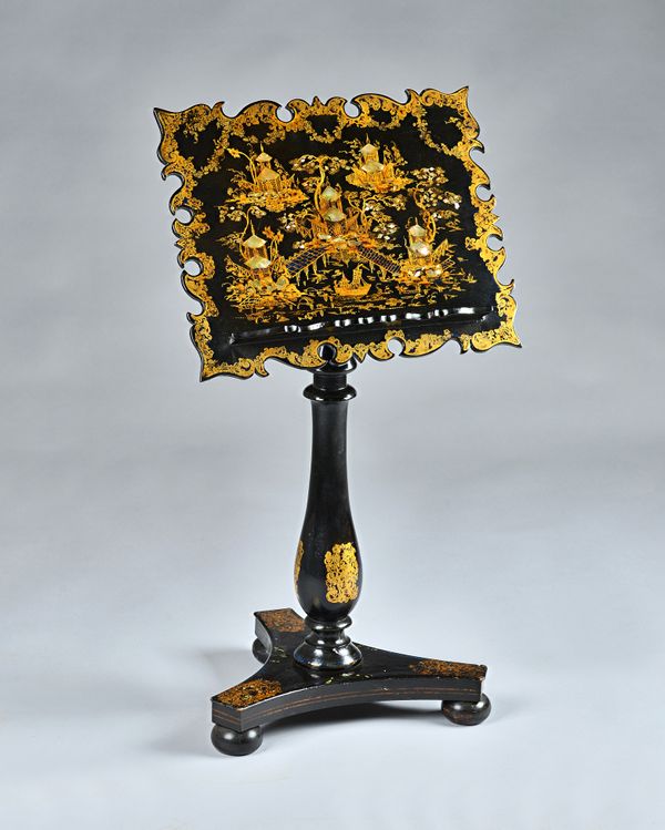 A Victorian black and gilt decorated music stand in the manner of Jennens and Bettridge, the shaped oblong top with mother-of-pearl inlay, and chinois