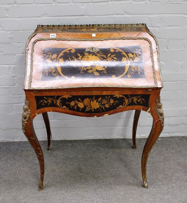 A 19th century French gilt metal mounted marquetry inlaid bureau, with fitted interior on cabriole supports, 76cm wide x 96cm high.