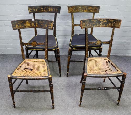 A set of four distressed Regency black and gilt japanned side chairs, with chinoiserie figures in landscapes and turned out-tapering legs, some with n
