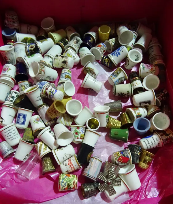 A box of mainly 20th century porcelain thimbles, (approx 127)