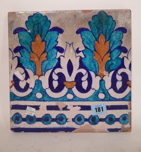 An underglaze painted pottery tile, probably Sindh, 19th century, decorated with repeated palmette motifs, 25cm.square.