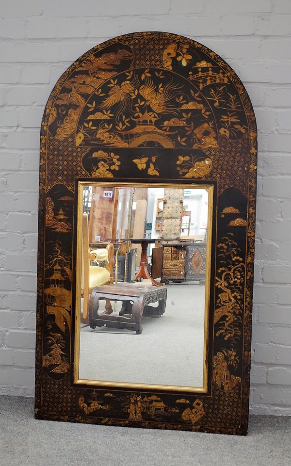 A large black and gilt chinoiserie decorated mirror, of arched rectangular form, 76cms wide, 140cms high.