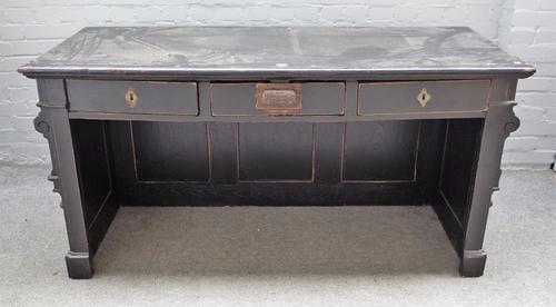 Gendarm; an ebonised French shop counter/till with three drawers, one fitted with a bell, 159cm wide x 80cm high.