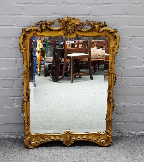 A 19th century gilt framed rectangular mirror, with floral moulded frame and bevelled plate, 72cm wide x 96cm high.