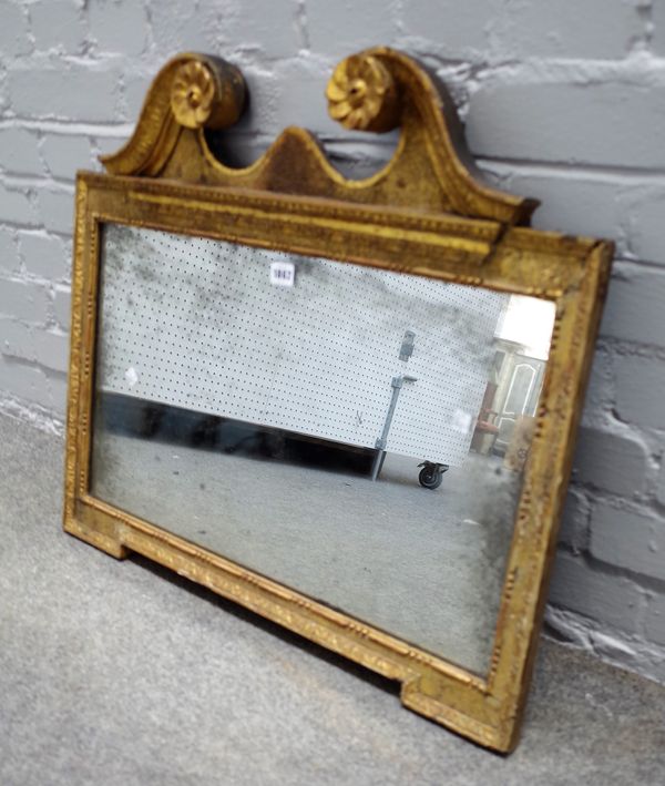 A George II and later adapted giltwood rectangular overmantel mirror, with broken swan neck pediment and egg and dart border, 61 by 71cms.