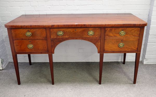 An early 19th century mahogany sideboard with five frieze drawers on tapering square supports, 180cm wide x 93cm high.