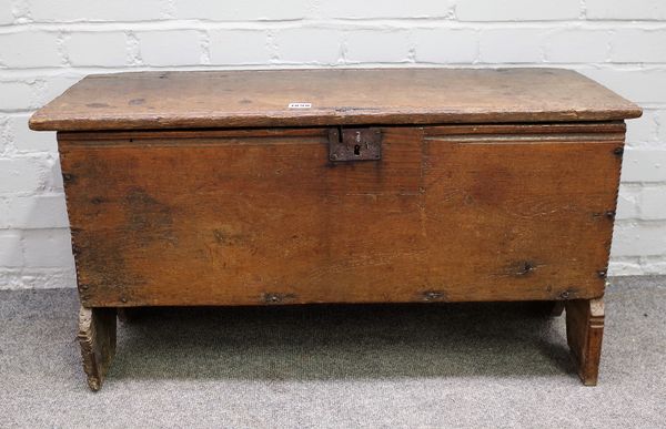 A small 17th century and later oak five plank coffer with chip work decoration, 83cm wide x 44cm high.