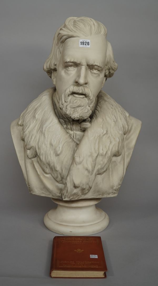 A large and rare Hewitt & Leadbeater parian bust of George Jacob Holyoake, dated 1909, modelled by A.Willis, raised on a socle base, impressed H & L a