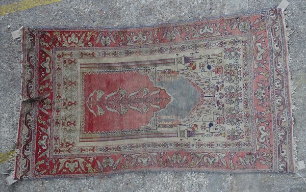 A Turkish prayer rug, 190cm x 108cm.