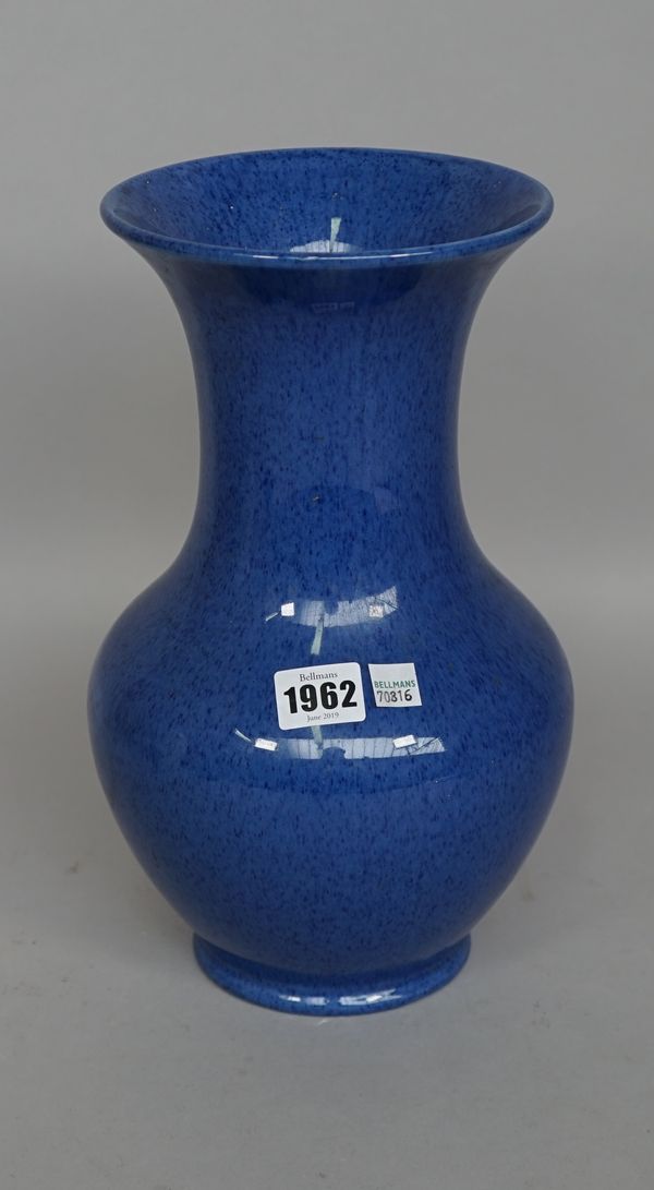 A Moorcroft powder blue pottery vase of baluster form, impressed mark to base, 31cm high.