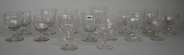 A group of sixteen glass rummers, 19th century, of various form and size, 11.5cm. to 15.5cm. high, (16).