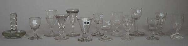 A group of thirteen small drinking glasses, late 18th/19th century, including; two firing glasses and a deceptive glass, 9cm. to 13cm. high; also a gl