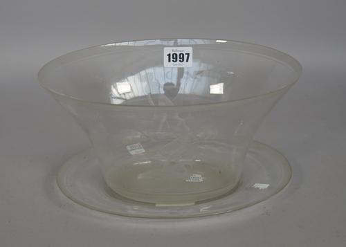 An Orrefors engraved glass bowl and stand designed by Edward Hald, circa 1931, the bowl of flared oval form, engraved each side with a female nude wit