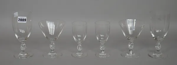 A part suite of Lalique crystal stemware 'Frejus' pattern, comprising; eleven water glasses, 16.5cm high, twelve wine glasses, 14cm high, eleven port