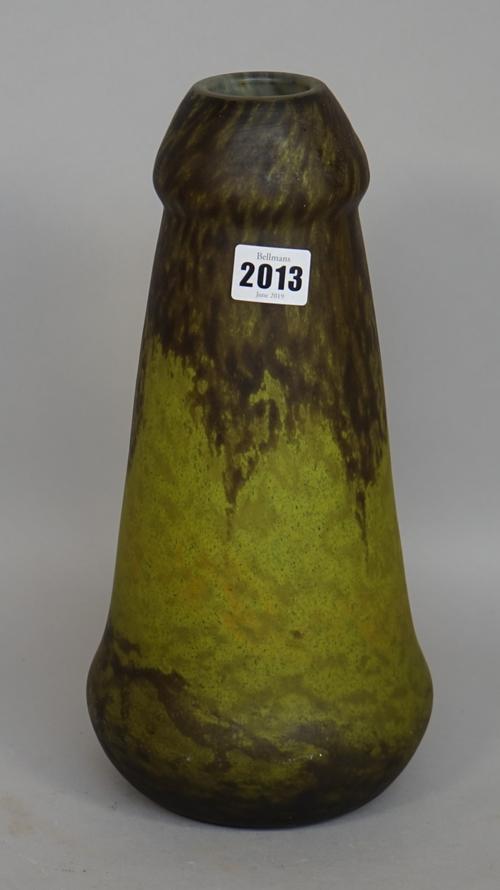 A Daum Nancy glass vase, early 20th century, of tapered cylindrical form with swollen mouth, of yellowish-green and mottled brown colour, wheel cut Da