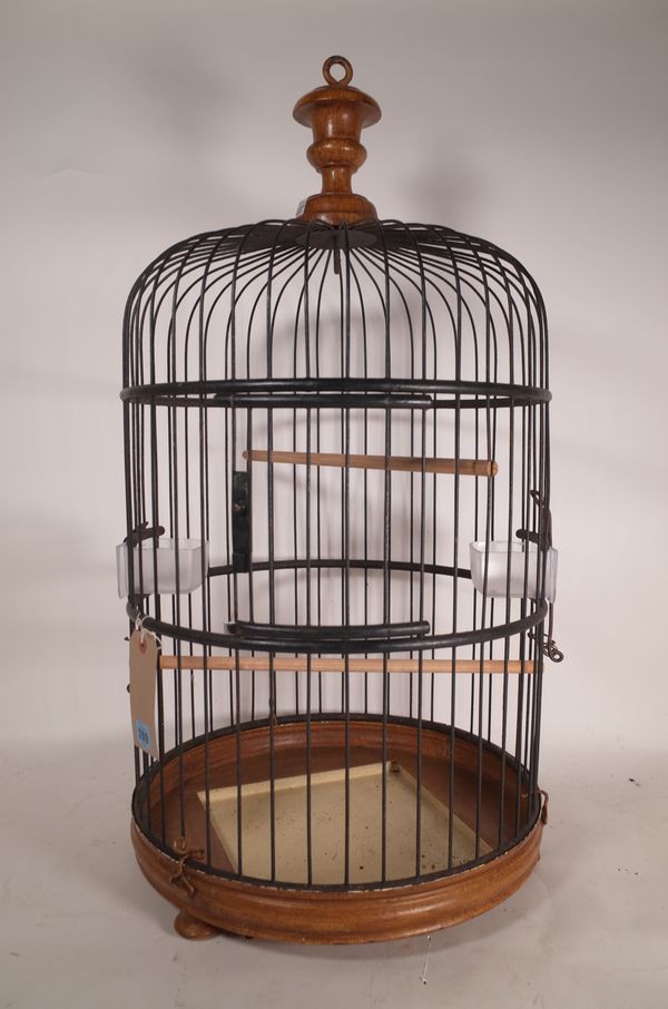 A 20th century French dome top bird cage 85cm high and another bird cage, 43cm wide x 51cm high, (2).