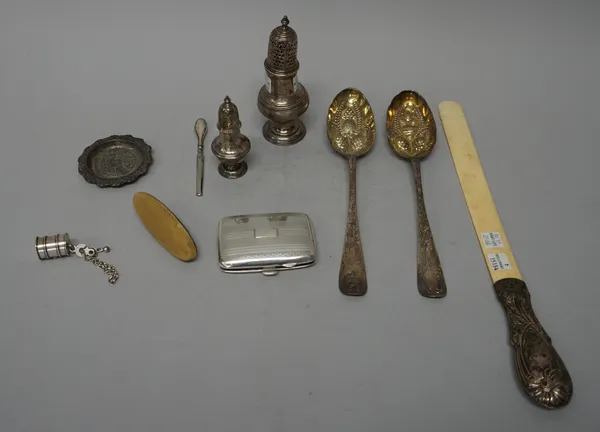 Silver and silver mounted wares, comprising; an Irish sugar caster, 18th century, the hallmarks rubbed, a pair of Irish berry spoons, with later embos