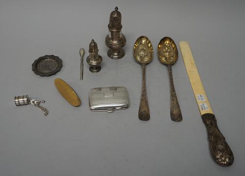 Silver and silver mounted wares, comprising; an Irish sugar caster, 18th century, the hallmarks rubbed, a pair of Irish berry spoons, with later embos