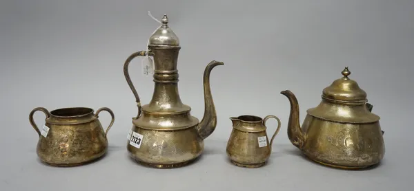 A mid-19th century French four piece tea and coffee set, comprising; a teapot (the handle lacking), a coffee pot, the hinged lid detached but present,