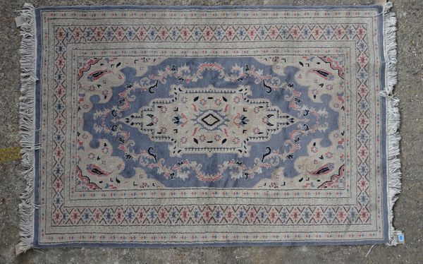 A Pakistan rug, 190cm x 127cm.