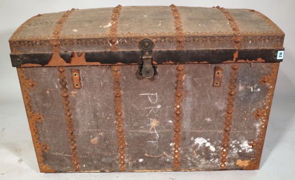 An early 20th century canvas and metal studded dome top trunk, 101cm wide x 68cm high.