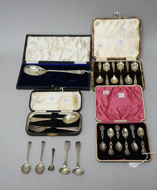 Silver flatware, comprising; a set of six coffee spoons, with pierced decoration to the handles, Sheffield 1922, a set of six coffee spoons, with engr