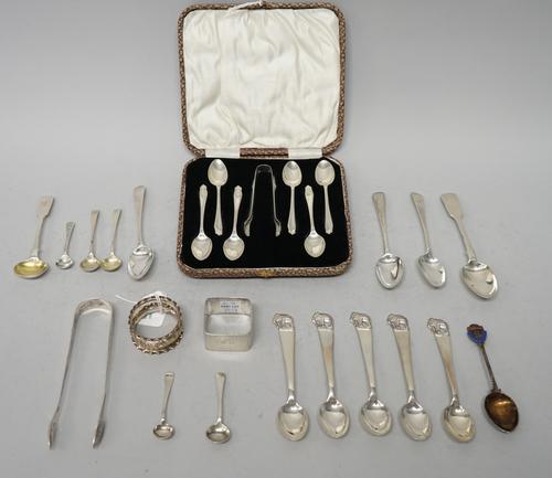 Silver, comprising; six coffee spoons and a pair of sugar tongs, cased, four teaspoons, five condiment spoons, two napkin rings, a pair of sugar tongs