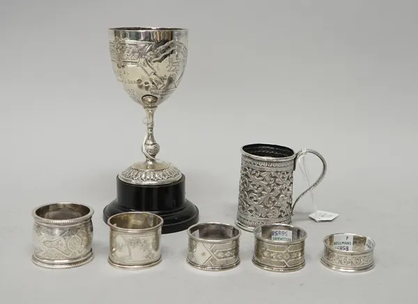 Silver, comprising; a trophy cup detailed 1st Hallamshire Battn, The York & Lancaster Reg, Sheffield 1929, height 14.5cm, with a black stand and three