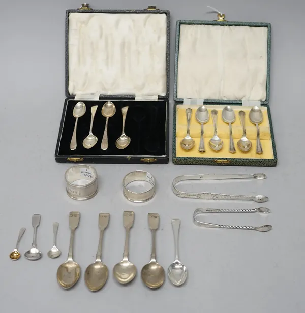 Silver, comprising; a set of six coffee spoons, cased, four coffee spoons, cased, five teaspoons, three condiment spoons, two pairs of sugar tongs and