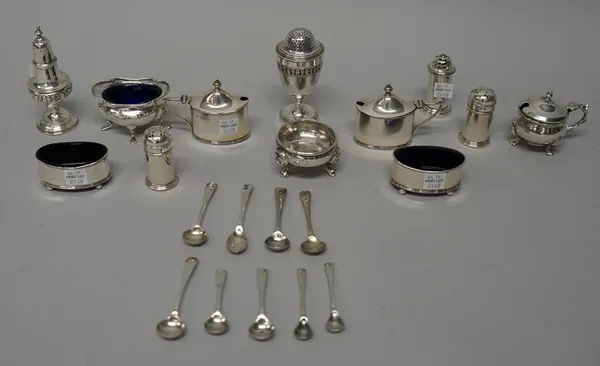 Silver, comprising; a six piece condiment set, comprising; a pair of salts, a pair of mustard pots and a pair of pepperettes, Birmingham 1927, with bl