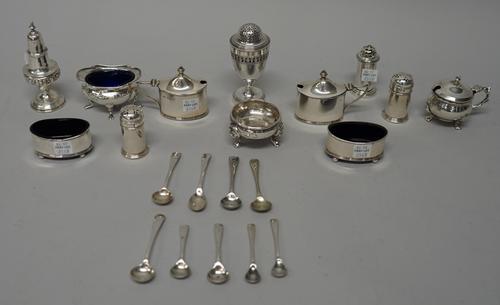 Silver, comprising; a six piece condiment set, comprising; a pair of salts, a pair of mustard pots and a pair of pepperettes, Birmingham 1927, with bl