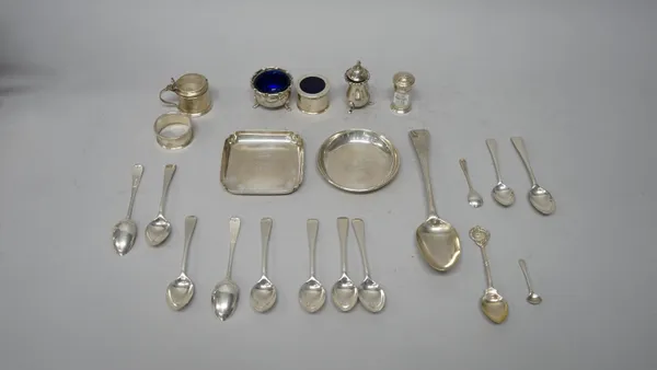 Silver, comprising; a bottom marked tablespoon, eleven various spoons, a napkin ring, a square dish, a circular dish, a three piece condiment set, wit