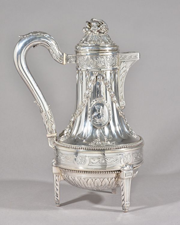 A German silver coffee pot, the body of swept form, decorated with oval portraits, foliate swags and with bold fluting above a beaded rim, raised on t