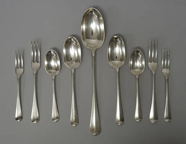 A silver rat tail pattern part table service, comprising; one stuffing spoon, five tablespoons, fifteen dessert spoons, twenty-two dessert forks and e