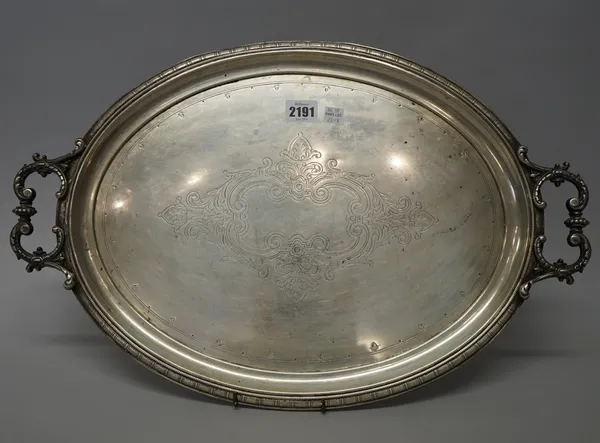 A European oval twin handled tray, with engraved decoration, detailed 800, length including the loaded handles 53cm, gross weight 1205 gms, also a pla