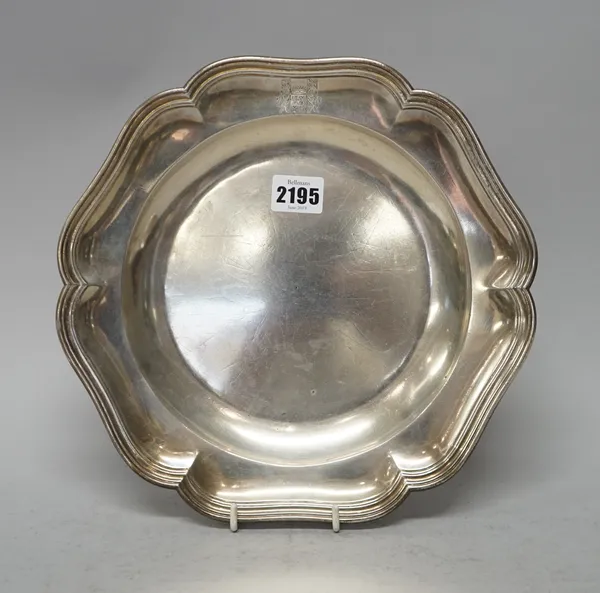 A European dish of shaped circular form, engraved with an armorial within a reeded rim, probably Liege Belgium, detailed 1744 Q, diameter 26.5cm, weig