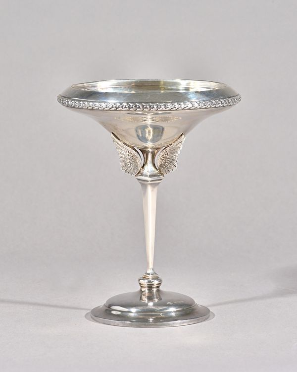 A George VI silver trophy cup, replicating The Senior's Championship Cup St Andrews, the tapered stem with cast bird wings, on a circular domed base,