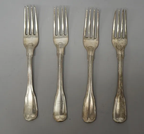 A set of four George III Irish silver fiddle and thread pattern table forks, by Michael Keating, Dublin 1790, combined weight 340 gms, (4).