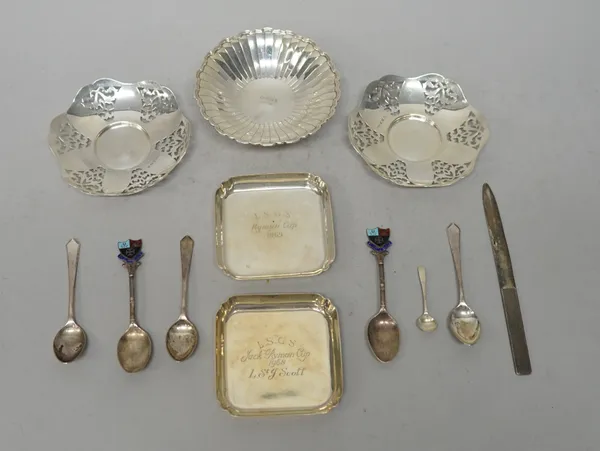 Silver, comprising; a pair of pierced bonbon dishes, Birmingham 1943, a pair of ashtrays, a pedestal bowl with shaped rim, a paper knife and six vario