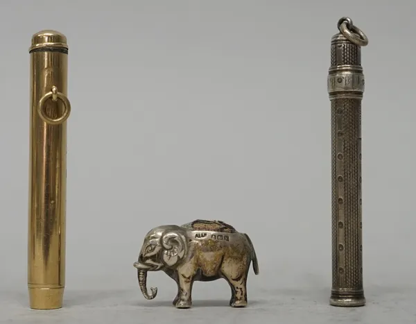 An Edwardian silver mounted pin cushion, modellled as a standing elephant, by Adie & Lovekin Ltd, Birmingham 1909, a 9ct gold mounted pencil holder, b