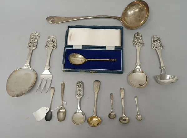 Silver, comprising; a George V soup ladle by Mappin & Webb, Sheffield 1915, a christening spoon with a cast owl finial, cased, six further spoons, com