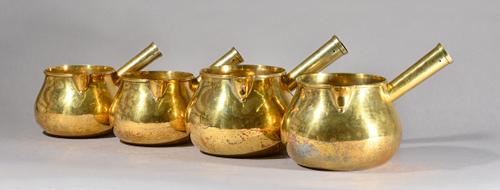 A substantial graduated set of two pairs of Elizabeth II silver gilt saucepans in the form of Queen Anne brandy warmers, S. J. Phillips, London, 1974,