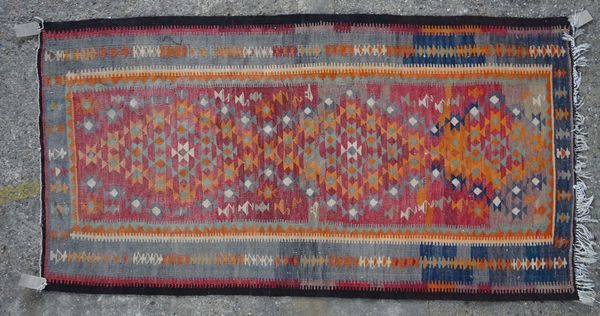 A Turkish gelim, polychrome striped design, 244cm x 130cm.