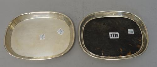 Two Mexican sterling silver trays, marked William Spratling Taxco Mexico 925, each of rounded rectangular form, one with tortoiseshell base, each 22.5