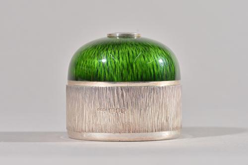 Gerald Benney; a silver and enamelled circular jewellery box and cover, London 1994, striated green enamelled domed lid with central Royal Presentatio